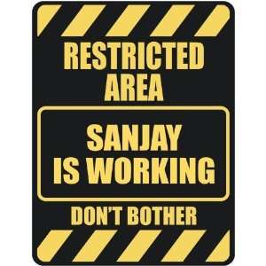   RESTRICTED AREA SANJAY IS WORKING  PARKING SIGN: Home 