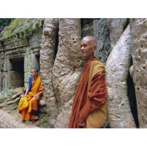 Buddhist Monks in Ta Prohm Temple, Angkor, Unesco World Heritage Site 