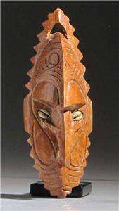 GOOD LITTLE GROUP OF OBJECTS; TWO SEPIK MASKS, ONE WITH NECKLACE; AN 