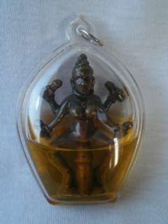 Blessed tantric Amulet filled with magic oil and a Temple cloth  