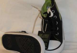   The Grinch high top canvas shoes come with black & white laces