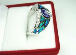 It is Ocean Blue Natural Fire Opal, Amethyst & Topaz cz with secondary 