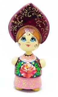 Souvenir Doll Russian Beauty in burgundy . The item is made of wood 
