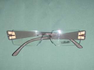 SILHOUETTE EYEGLASS FRAMERIMLESS SQUARE WITH BROWN TEMPLES & COPPER 