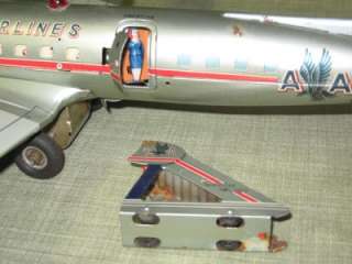   VINTAGE DC 7C AMERICAN AIRLINES TIN TOY PLANE MODEL 23 DC 7  