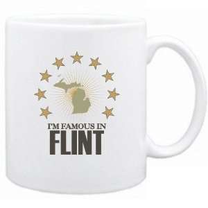   : New  I Am Famous In Flint  Michigan Mug Usa City: Home & Kitchen
