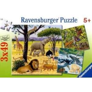 Ravensburger Puzzle Tiere der Erde. 3 x 49 Teile  Bücher