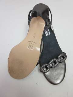 You are bidding on a pair of ISAAC Silver Tone Leather Heels 