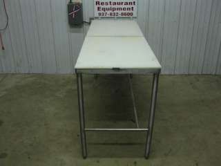   looking at a 70 5/8 wide stainless steel table w/ cutting board top