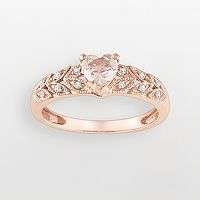Gorgeous and glowing. This 10k rose gold filigree ring adds feminine 